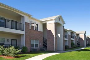 Weatherford apartment for rent - Apartment complex with a clear blue sky above.