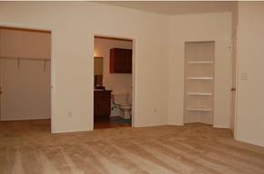 Weatherford apartment for rent - A room with a toilet and a cabinet in it.