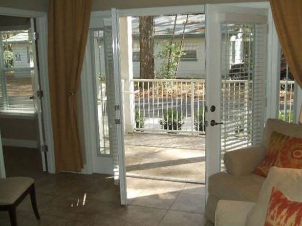 Gainesville apartment for rent - french doors and lots of natural light in living room
