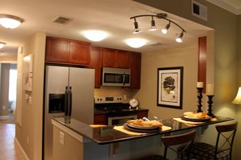 Full suite of stainless steel kitchen appliances