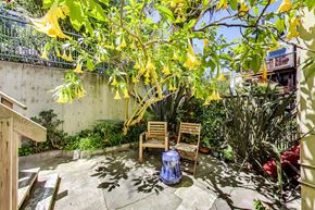 San Francisco apartment for rent - A small patio with a chair and table.