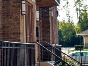 Cincinnati apartment for rent - the front of a house with a porch and a pool