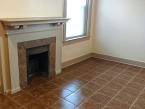 Cincinnati apartment for rent - the living room with the fireplace and tiled floor