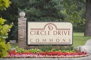 Detroit apartment for rent - A sign that says Circle Drive Commons in front of some trees.