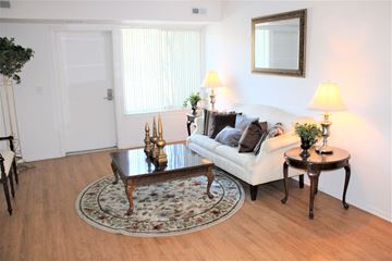 Detroit apartment for rent - a living room with a couch and a coffee table
