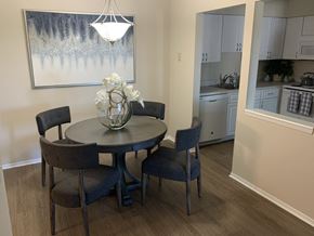 Northville apartment for rent - a kitchen and dining area with a table and chairs