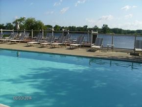 Northville apartment for rent - A pool with chairs around it and a date stamp of 06/03/2014.