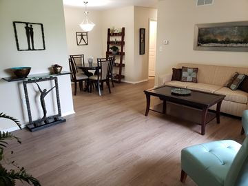 Northville apartment for rent - a living room and dining room with a table and a couch
