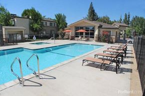 Sacramento apartment for rent - Pet-Friendly Apartments in Sacramento CA - La Provence - Large Pool, Gated Area, Lounge Chairs, and Manicured Lawn