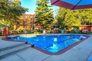 Philadelphia apartment for rent - Pool with lounge chairs and umbrellas