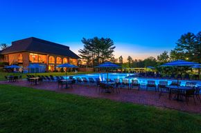 Huntingdon Valley apartment for rent - Lit up pool by clubhouse at night.