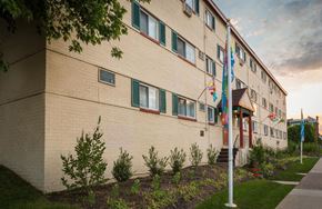Philadelphia apartment for rent - A building with a flag hanging from the front.
