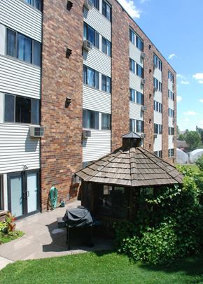 Moose Lake apartment for rent - an outdoor gazebo in front of an apartment building