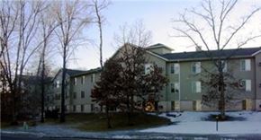 Circle Pines apartment for rent - an apartment building in the winter with snow