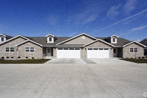 Westfield apartment for rent - A large house with a grey roof and a white garage door.