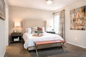 Westfield apartment for rent - A bedroom with a large bed and a painting on the wall.