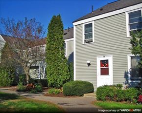 Duxbury apartment for rent - a house with a red door and a garden