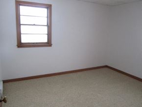 Morris apartment for rent - an empty room with a window and a carpet