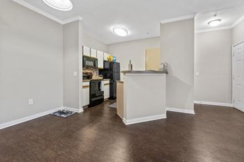 Premiere package includes: black appliance package, granite-style countertops, updated flooring, lighting & hardware,  two-tone designer paint & framed bathroom mirrors