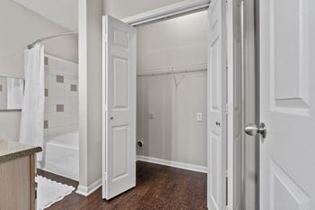 Premiere package includes: black appliance package, granite-style countertops, updated flooring, lighting & hardware,  two-tone designer paint & framed bathroom mirrors