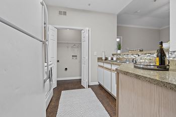 Standard package includes: white appliance package, granite-style countertops & two-tone designer paint