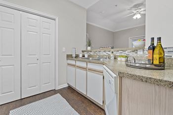 Standard package includes: white appliance package, granite-style countertops & two-tone designer paint