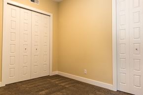 Caledonia apartment for rent - a bedroom with two closets and two doors