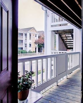 Kansas City apartment for rent - Image of balcony with plants and stairs