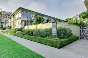 Santa Monica apartment for rent - a house with a yard and a sign in front of it
