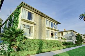 Santa Monica apartment for rent - a large house with a sidewalk in front of it