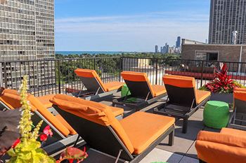 Rooftop deck with lounge chairs
