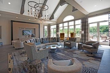 Mount Arlington apartment for rent - a large living room with couches and chairs and large windows