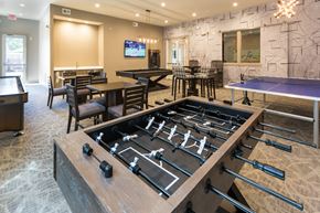 Mount Arlington apartment for rent - a game room with a foosball table and ping pong