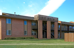 Bartlesville apartment for rent - this is a photo of the courtyard at harvard square apartments in dallas, tx