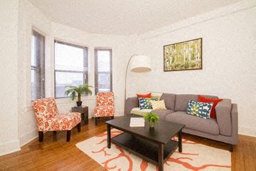 Philadelphia apartment for rent - a living room with a couch and a table