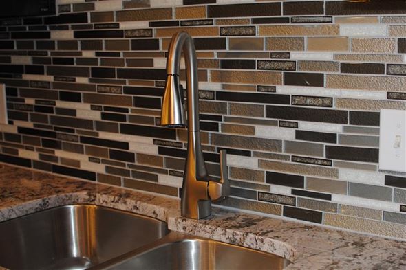 Denton apartment for rent - a kitchen with a sink and a faucet