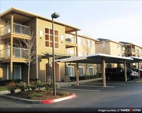 Gresham apartment for rent - Apartment complex with a parking lot in front.