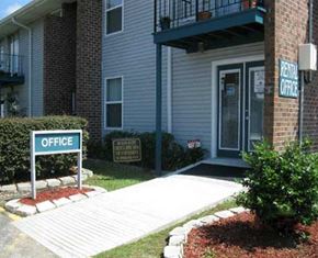 Harvey apartment for rent - a sign that is in front of a building