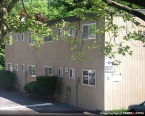 Portland apartment for rent - A building with a sign that says 5 on it.