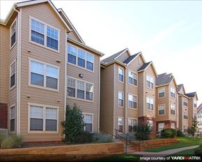 Edmond apartment for rent - a row of apartment buildings on a city street