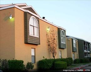 Houston apartment for rent - a building with a light on the side of it
