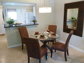 Deerfield Beach apartment for rent - a dining room with a table with plates of food on it