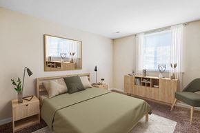 Glen Burnie apartment for rent - a bedroom with a bed and a mirror on the wall