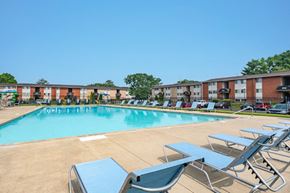 Middle River apartment for rent - our apartments offer a swimming pool with lounge chairs