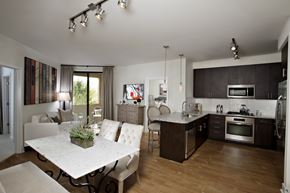 Scottsdale apartment for rent - A modern kitchen with a dining table and chairs.