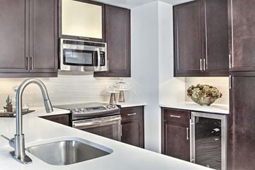 Charlotte apartment for rent - a kitchen with a sink and a microwave