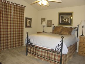 Gainesville apartment for rent - bedroom with bed and dresser