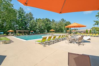 Two resort-style swimming pool with expansive sundeck
