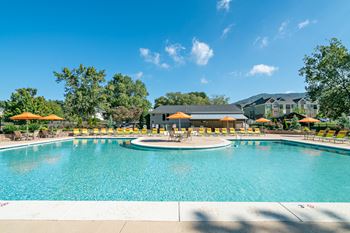 Two resort-style swimming pool with expansive sundeck