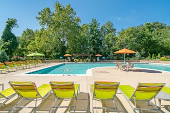 Two resort-style swimming pool with expansive sundeck